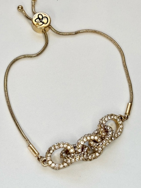 Jessica Simpson Jewelry - Jessica Simpson Gold Crystal Link Slider Bracelet with Clear Stones